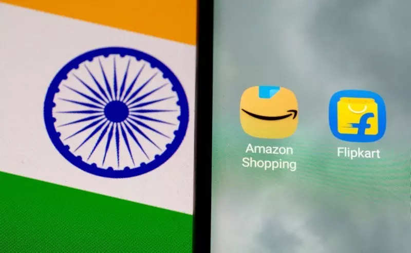 FILE PHOTO: Amazon Shopping and Flipkart apps are seen on a smartphone placed on an Indian flag in this illustration taken